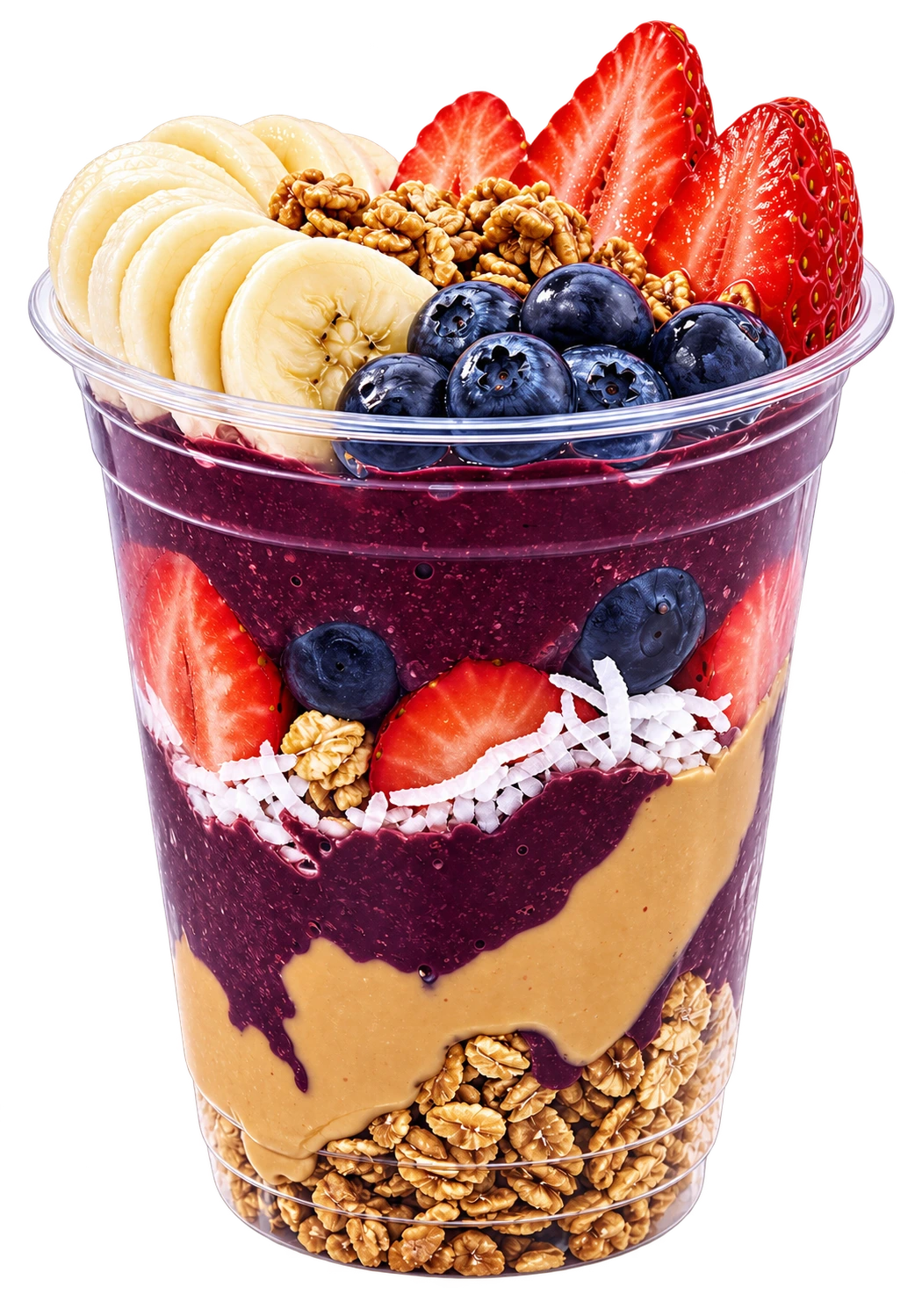 Açaí cup layered with strawberries, bananas, blueberries, granola, coconut and peanut butter